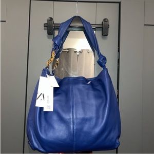 METAL TRIM LEATHER TOTE